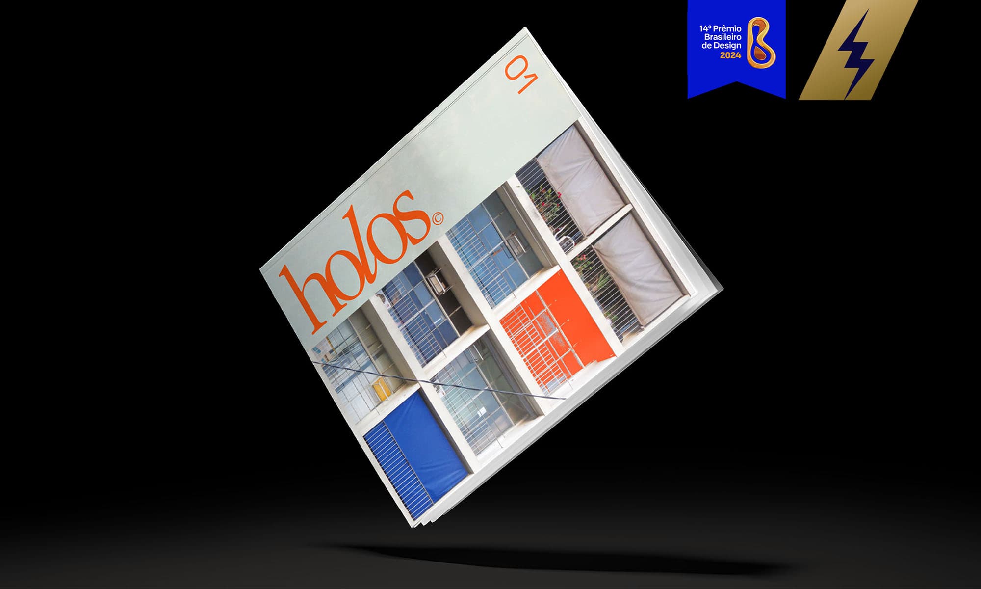 Capa da edição 01 da Holos com os selos de premiação